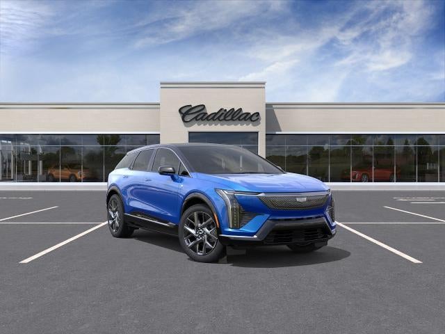 2026 Cadillac OPTIQ Premium Luxury in Coastal Blue Metallic — front three-quarter view